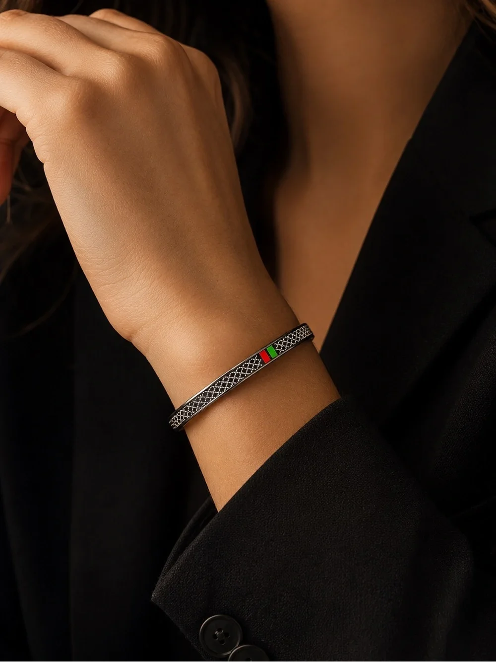 Luxury Silver Bangle Bracelet with Red and Green Accents